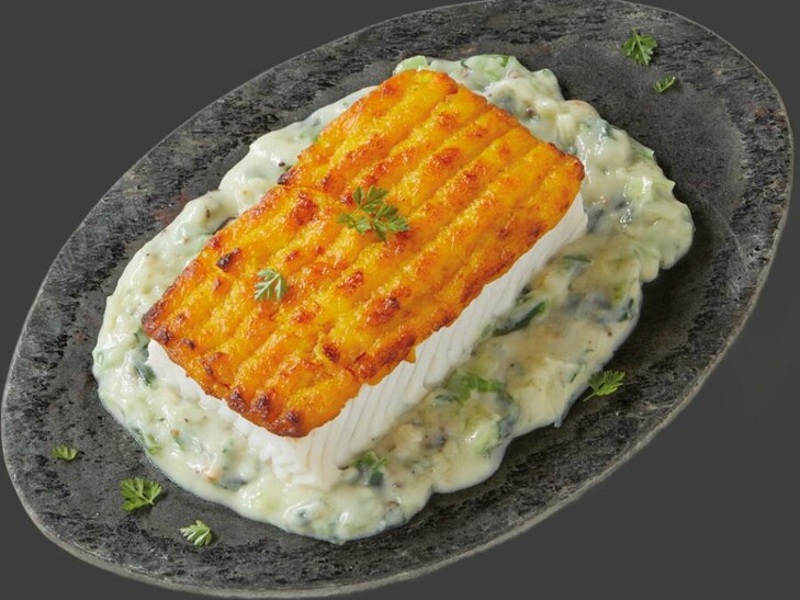 „Ofen-Fisch“ auf Lauch-Ragout mit Kürbishaube
